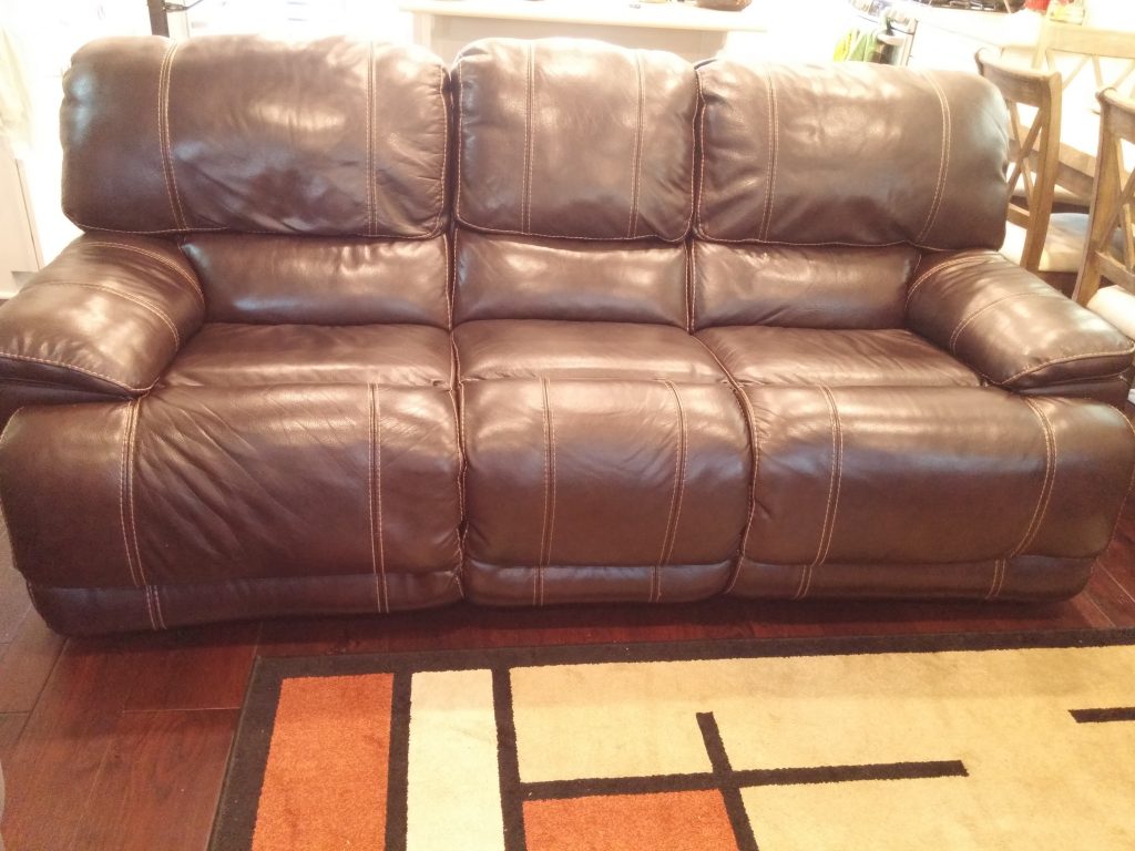Like new top grain leather recliner sofa for sale 769 OBO